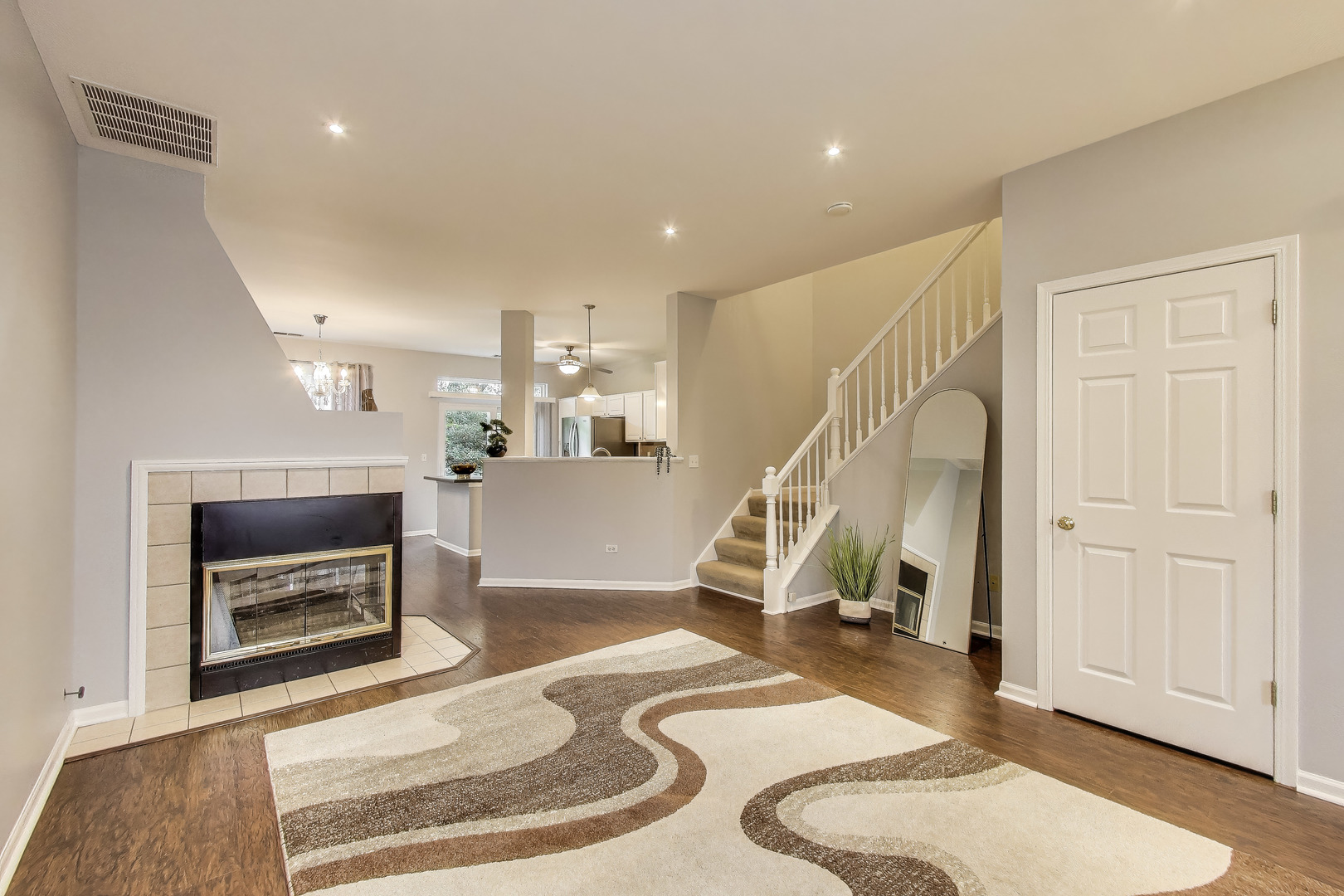 24115 Pear Tree Circle Plainfield, IL 60585 - Photo 4 of 15 a view of a livingroom with furniture and a fireplace