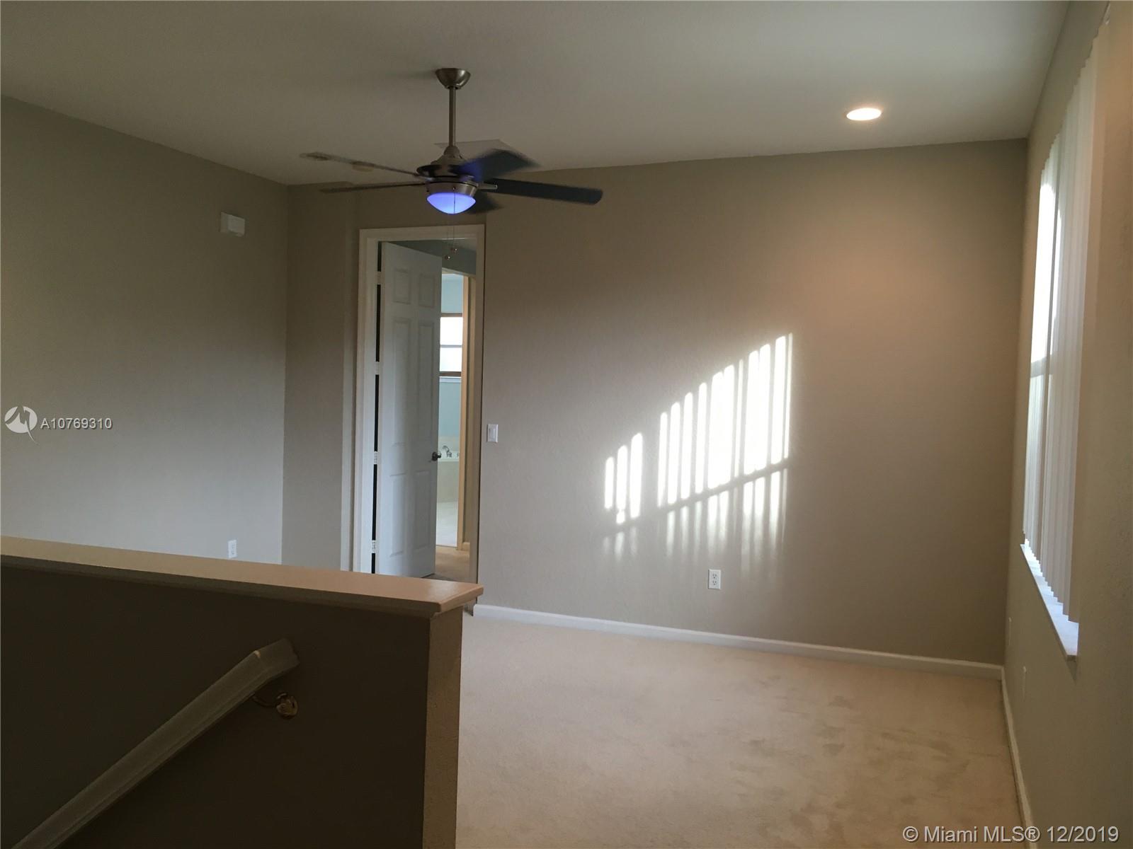 332 Southwest Otter Run Place, Unit 332 Stuart, FL 34997 - Photo 14 of 24 Loft space! Can be a playspace, den, office, whatever you wish.