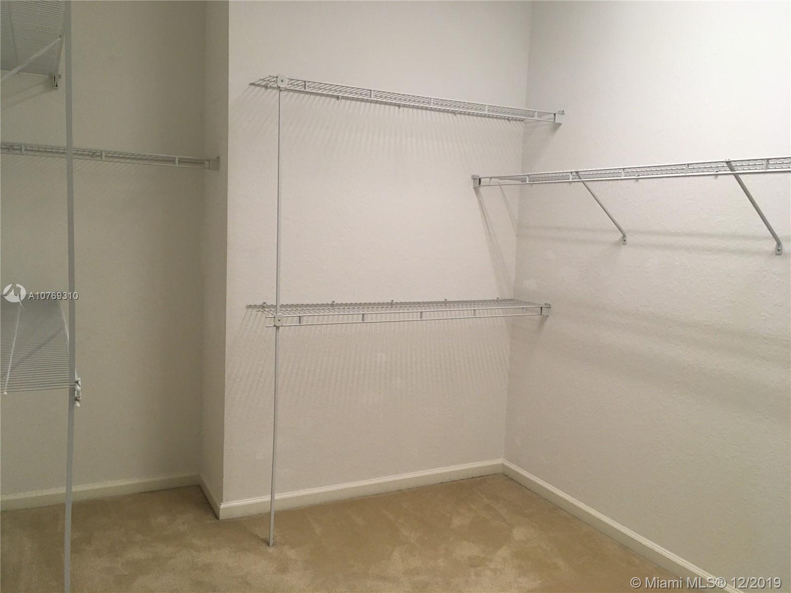 332 Southwest Otter Run Place, Unit 332 Stuart, FL 34997 - Photo 16 of 24 Look how big this Master Closet is!