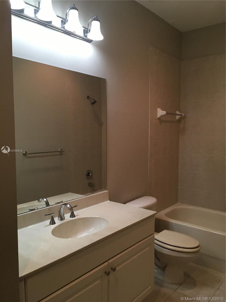 332 Southwest Otter Run Place, Unit 332 Stuart, FL 34997 - Photo 19 of 24 second full bathroom upstairs