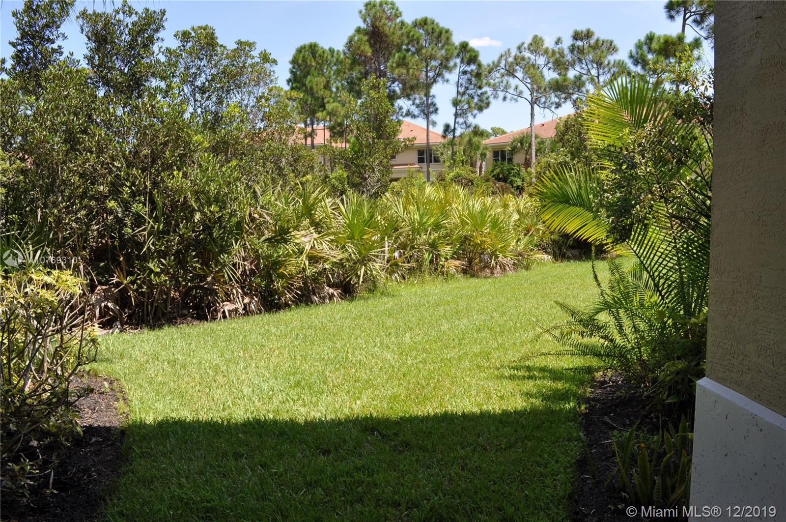 332 Southwest Otter Run Place, Unit 332 Stuart, FL 34997 - Photo 24 of 24 Big, beautiful private backyard.
