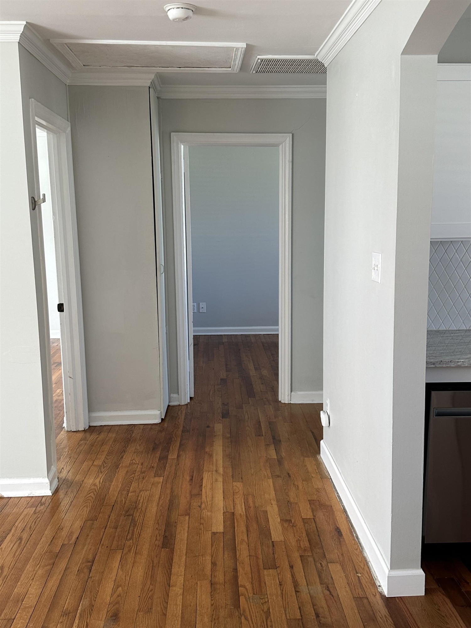 2344 Bernard Street, Unit 3 Raleigh, NC 27608 - Photo 8 of 15 a view of a hallway with wooden floor and closet