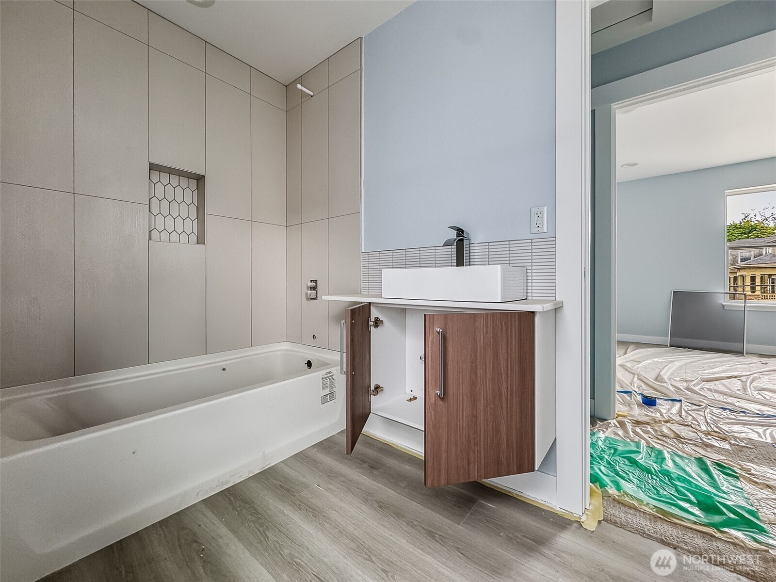 2317 22nd Avenue South Seattle, WA 98144 - Photo 21 of 29 a room with a bed and a bathroom