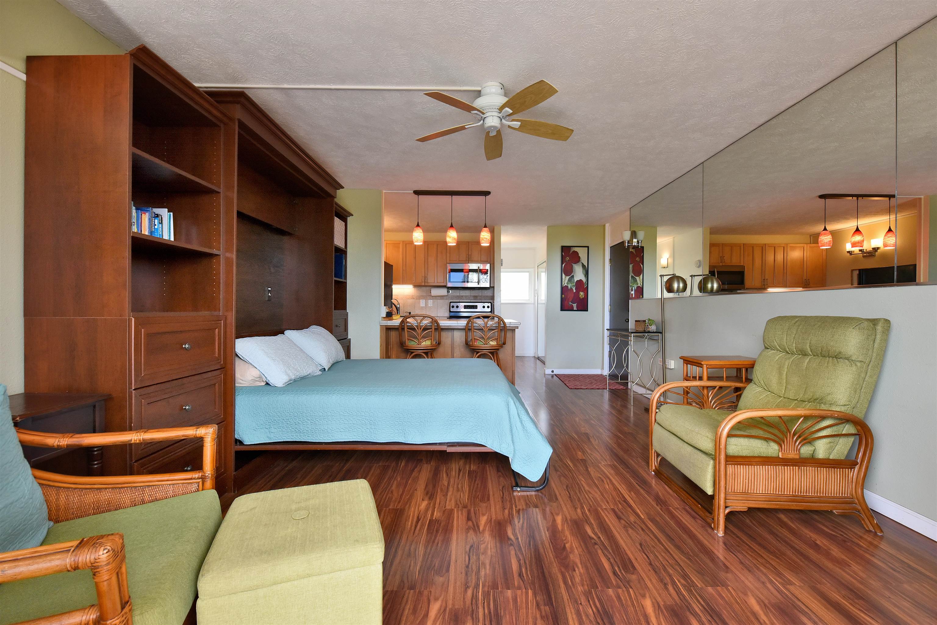 120 Hui Rd F, Unit K 11 Lahaina, HI 96761 - Photo 11 of 47 a living room with furniture and a wooden floor
