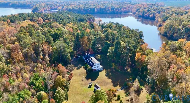 a view of a lake with a big yard