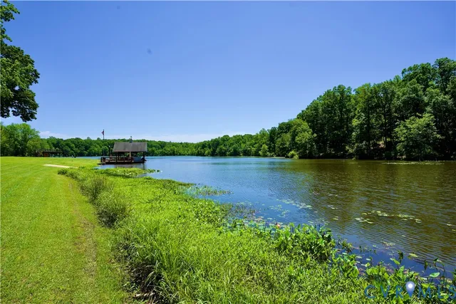 a front view of a house with a yard table and chairs