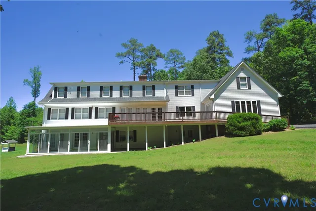 a view of a house with a big yard