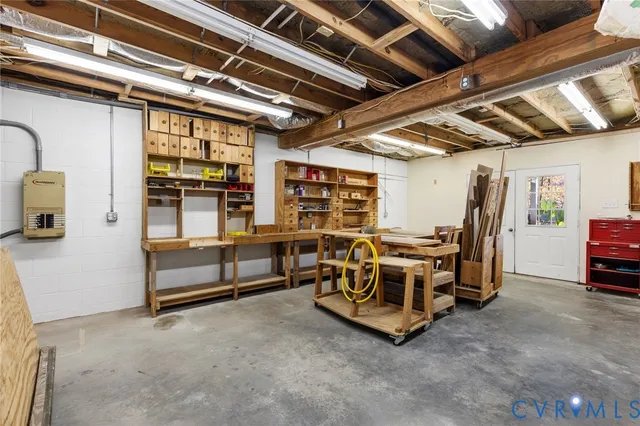 a view of swimming pool with a garden and trees