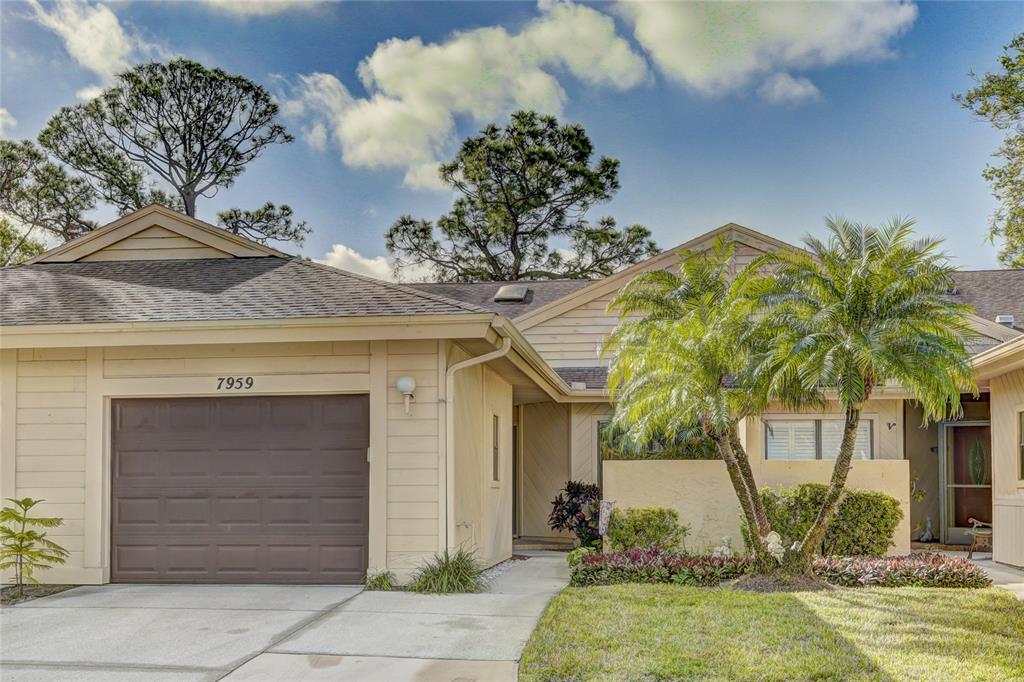 7959 Pineglen Court, Unit 40 Sarasota, FL 34238 - Photo 1 of 30 a front view of a house