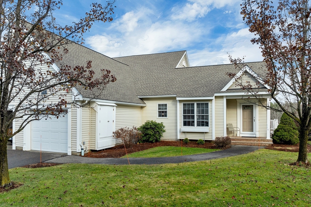 401 Autumn Ridge Drive, Unit 401 Ayer, MA 01432 - Photo 2 of 33 front view of a house with a yard