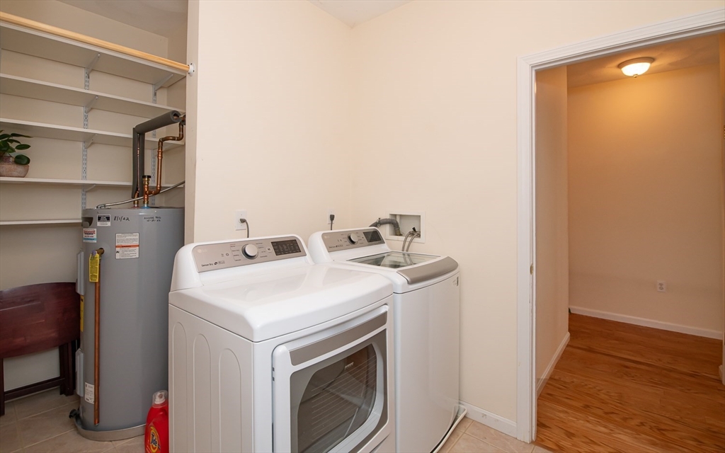 401 Autumn Ridge Drive, Unit 401 Ayer, MA 01432 - Photo 26 of 33 a utility room with dryer and washer