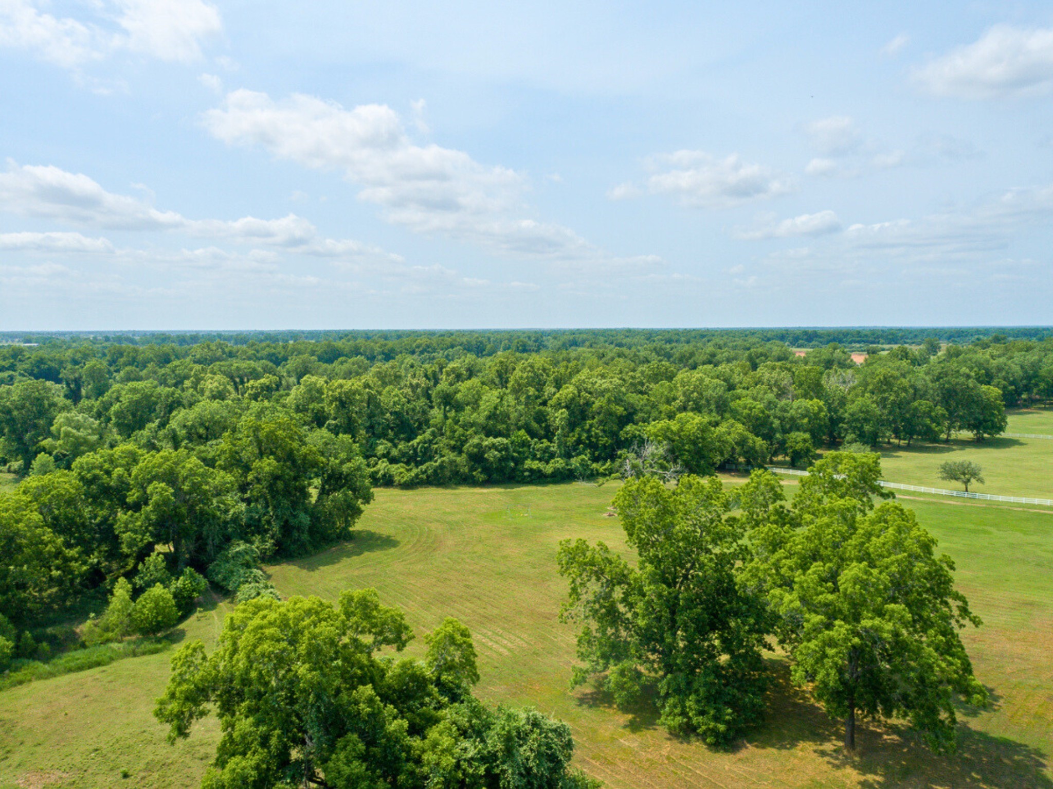 Tbd River Ridge Road Sealy, TX 77474 - Photo 8 of 10 a view of a lake with houses in the back