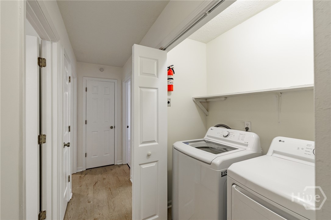 135 Longbranch Court Athens, GA 30605 - Photo 11 of 37 Hallway with Laundry Doors Open