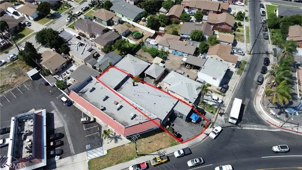 an aerial view of a building with outdoor space