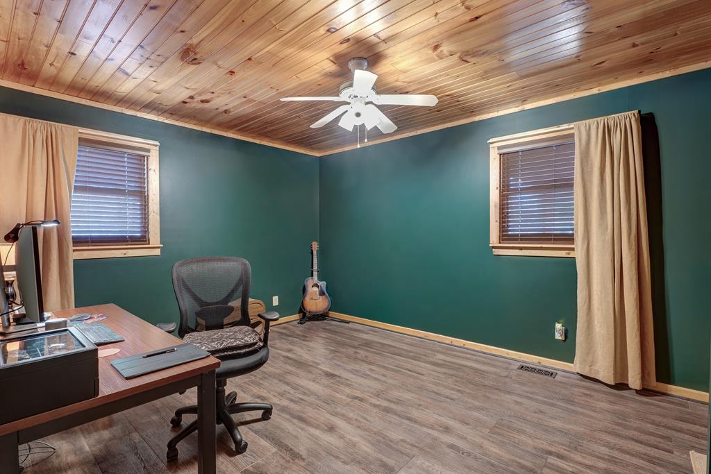 388 Cozy Cove Road Blairsville, GA 30512 - Photo 12 of 44 a workspace with furniture and a window