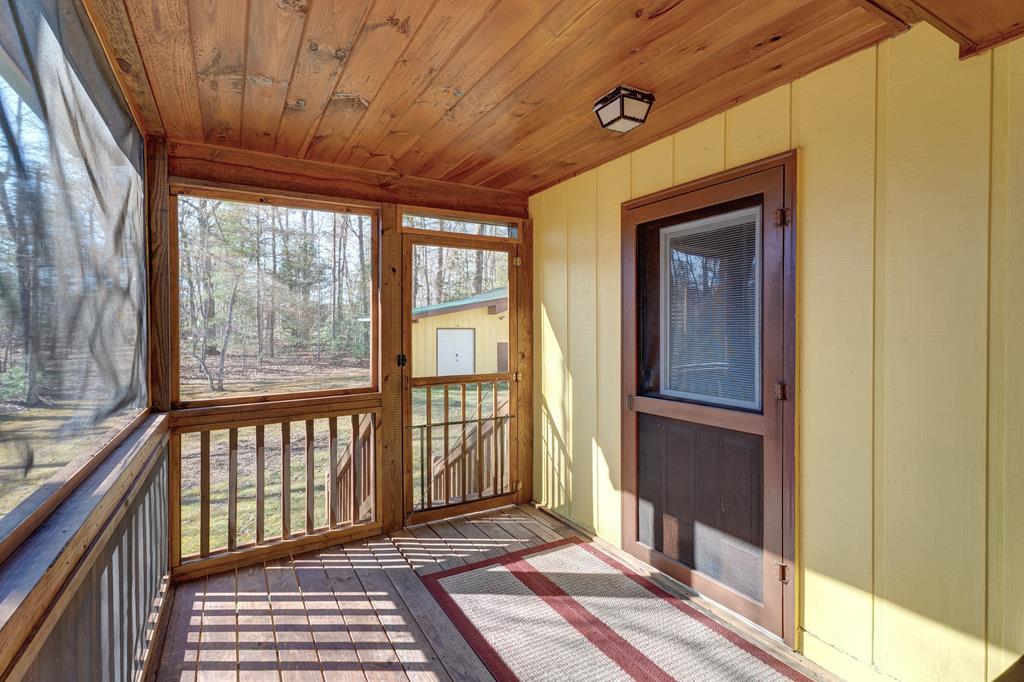 388 Cozy Cove Road Blairsville, GA 30512 - Photo 21 of 44 a view of a balcony with wooden floor