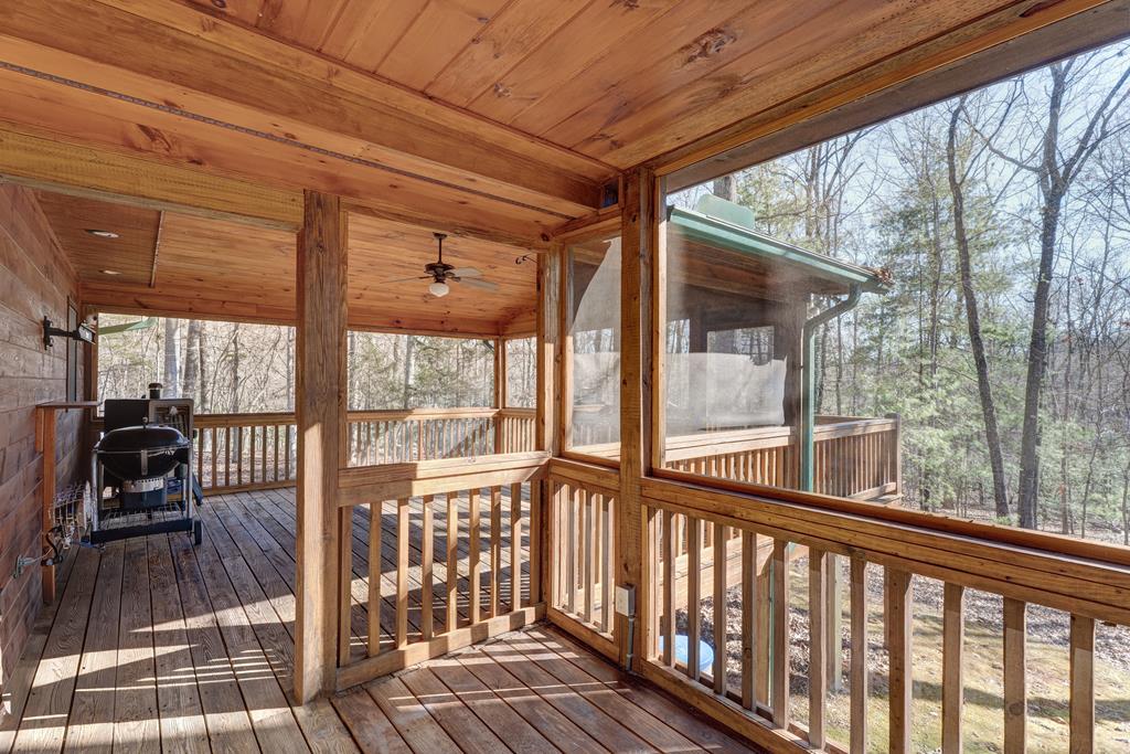 388 Cozy Cove Road Blairsville, GA 30512 - Photo 22 of 44 a view of a balcony with wooden floor