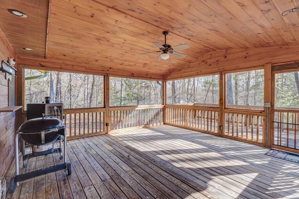 388 Cozy Cove Road Blairsville, GA 30512 - Photo 23 of 44 a view of a balcony with furniture