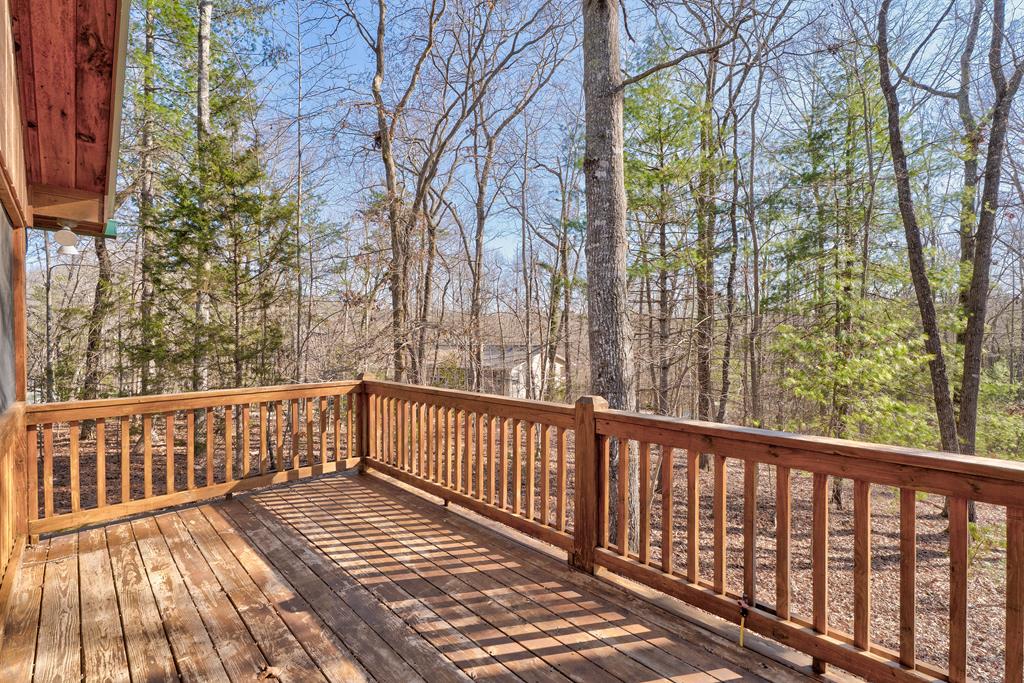 388 Cozy Cove Road Blairsville, GA 30512 - Photo 25 of 44 a view of balcony with wooden floor and fence