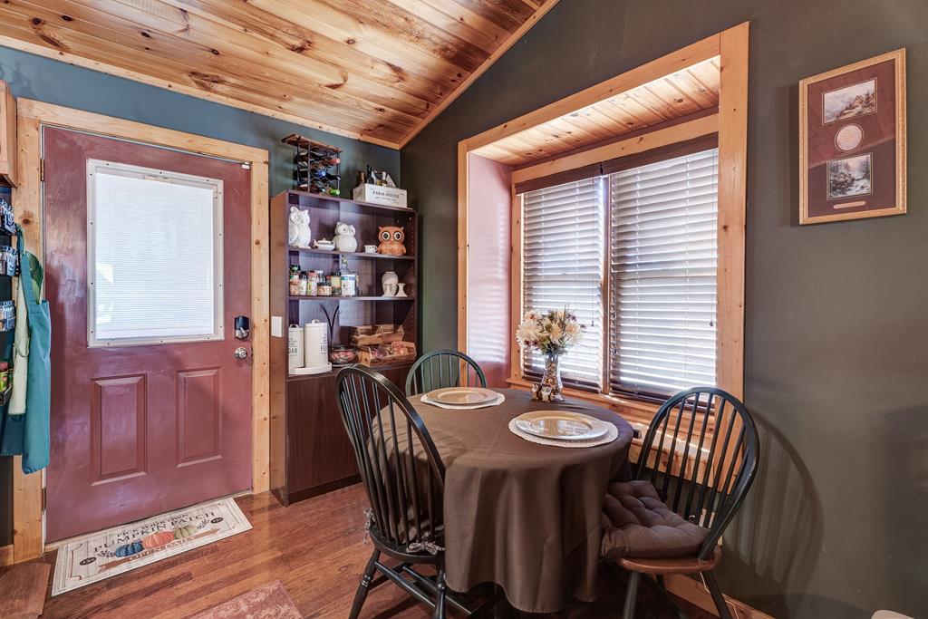 388 Cozy Cove Road Blairsville, GA 30512 - Photo 6 of 44 a view of a dining room with furniture and window