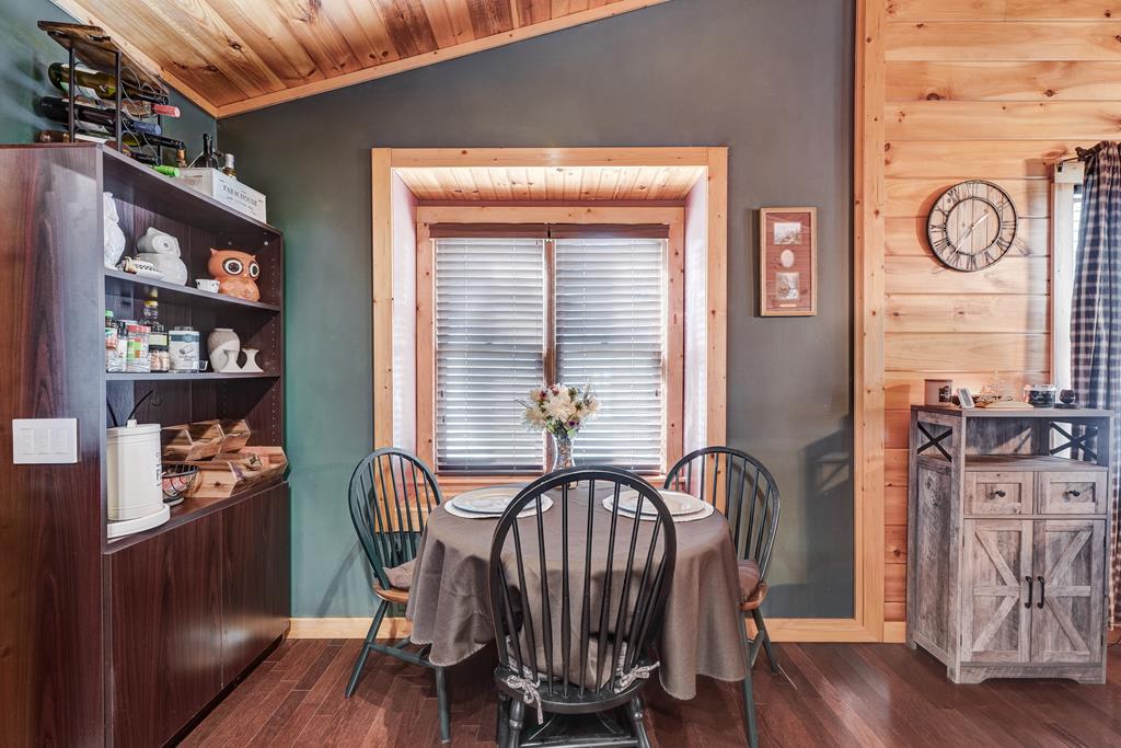 388 Cozy Cove Road Blairsville, GA 30512 - Photo 9 of 44 a view of a room that has a table and a chair in it