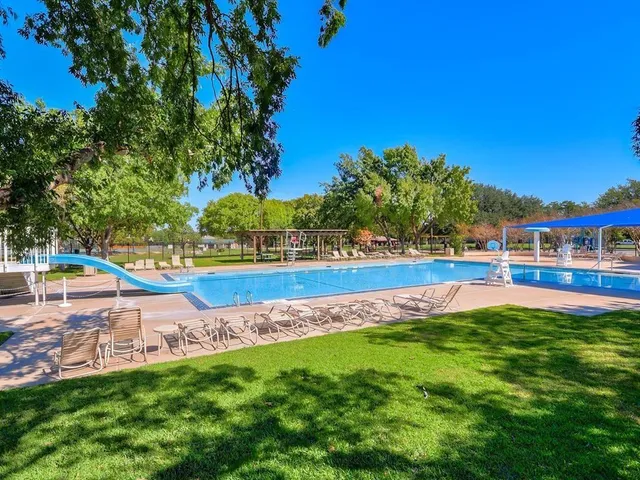 a view of an outdoor space and swimming pool
