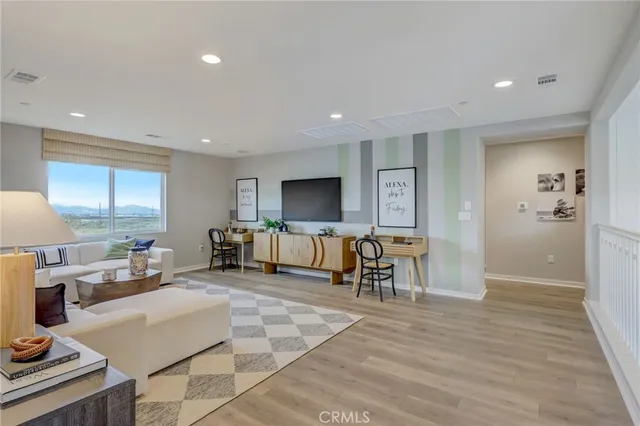 a bathroom with double vanity sinks a mirror and a shower
