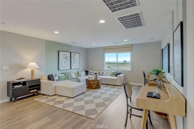 a bedroom with a bed and a mirror