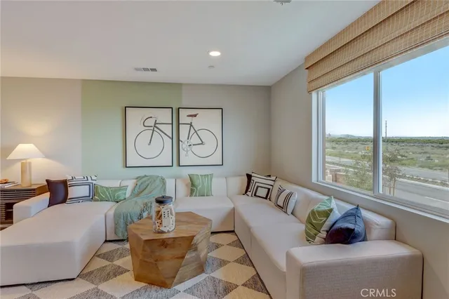 a bedroom with a bed and a cabinets