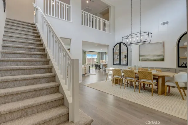 a view of a hallway with seating area