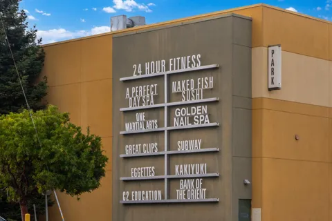 a view of swimming pool with seating space