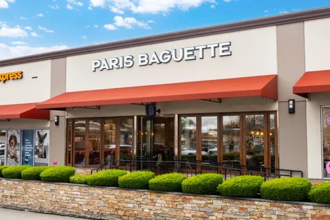 a view of a brick house with a window