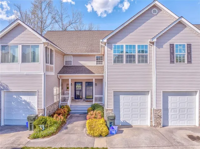 an aerial view of a house with swimming pool