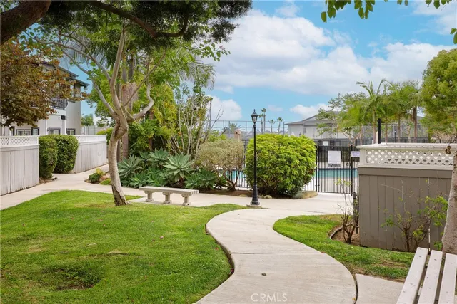 a view of a garden with a fountain