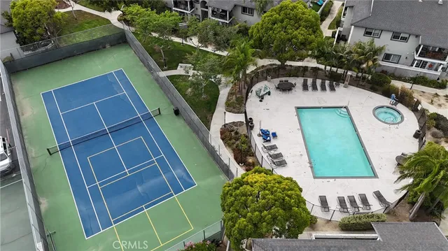 a view of a swimming pool with a patio