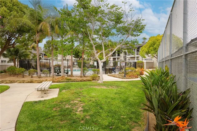 a view of a backyard with sitting area