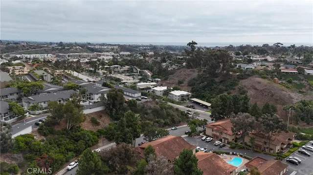 an aerial view of a house with a garden