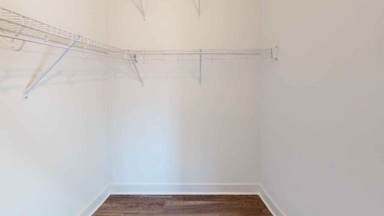 Undisclosed Address Chicago, IL 60640 - Photo 4 of 9 a view of a room with racks on the wall