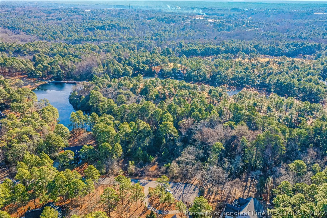 328 Fieldcrest Road Southern Pines, NC 28387 - Photo 1 of 4 a view of a garden with a house