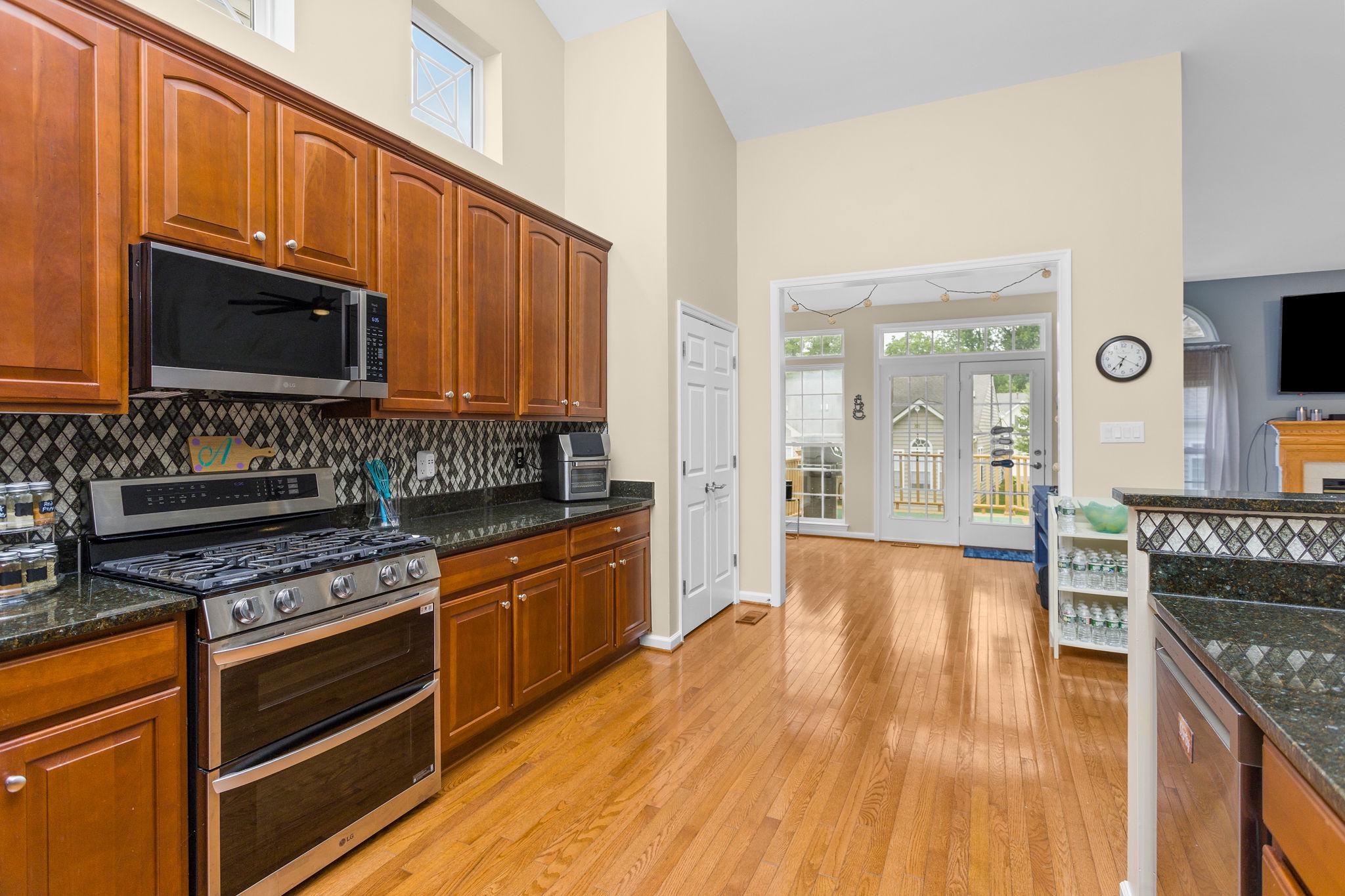 5 Tommys Meadow Pemberton, NJ 08068 - Photo 12 of 29 Open-concept kitchen with elegant finishes.