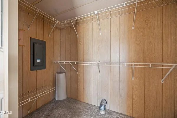 a spacious bathroom with a granite countertop sink mirror and double