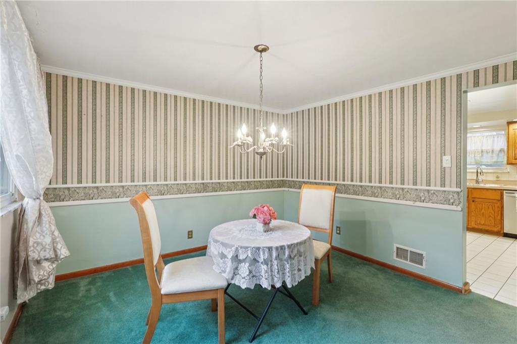 631 George Street Turtle Creek, PA 15145 - Photo 11 of 44 a workspace with furniture and a window