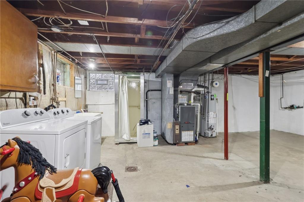 631 George Street Turtle Creek, PA 15145 - Photo 30 of 44 a utility room with dryer and washer