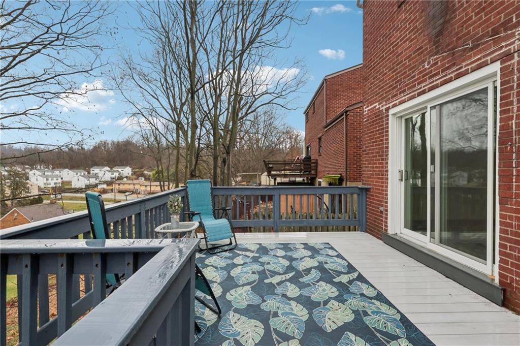 631 George Street Turtle Creek, PA 15145 - Photo 35 of 44 a view of balcony with wooden floor and fence