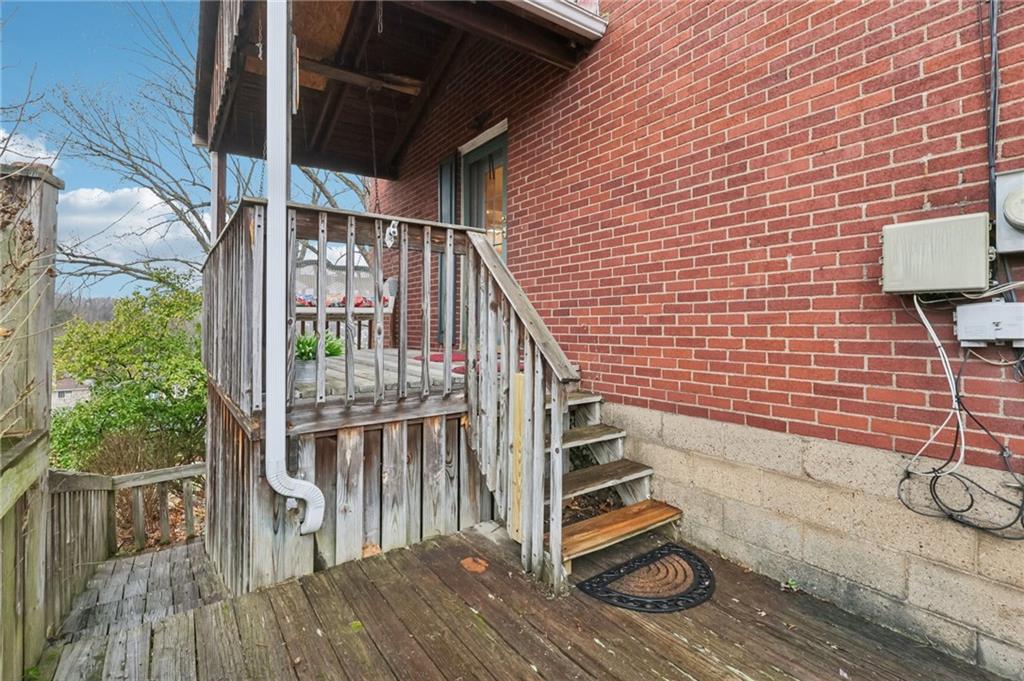 631 George Street Turtle Creek, PA 15145 - Photo 37 of 44 a view of entryway with wooden floor and fence