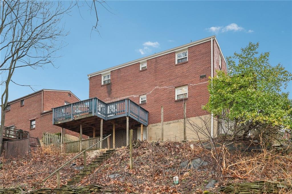631 George Street Turtle Creek, PA 15145 - Photo 41 of 44 a front view of a house with a yard
