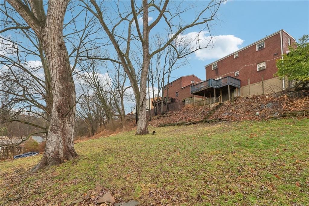 631 George Street Turtle Creek, PA 15145 - Photo 42 of 44 a view of a yard with a house