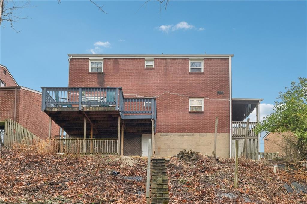 631 George Street Turtle Creek, PA 15145 - Photo 43 of 44 a front view of a house with plants