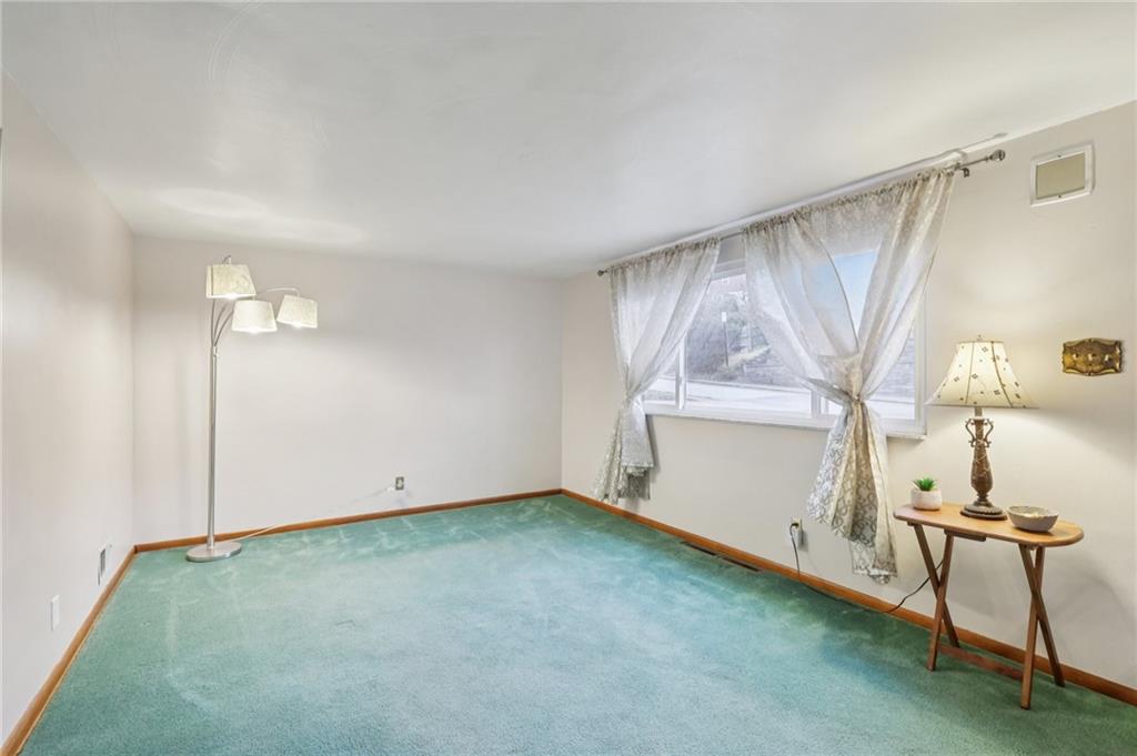 631 George Street Turtle Creek, PA 15145 - Photo 6 of 44 an empty room with a door