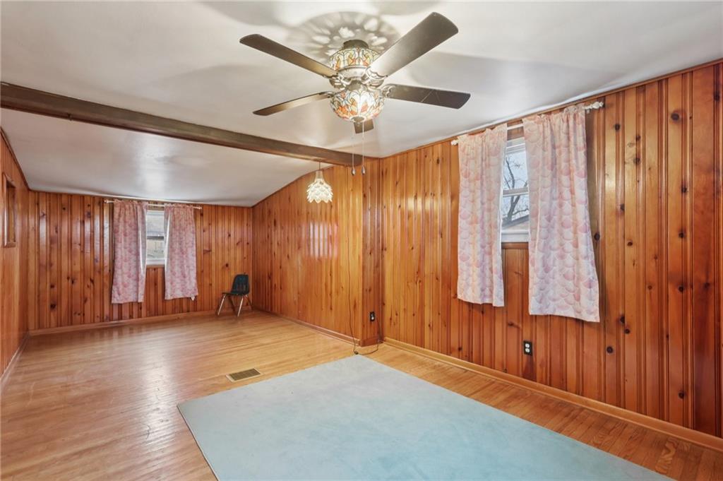 631 George Street Turtle Creek, PA 15145 - Photo 8 of 44 wooden floor in an empty room with a window